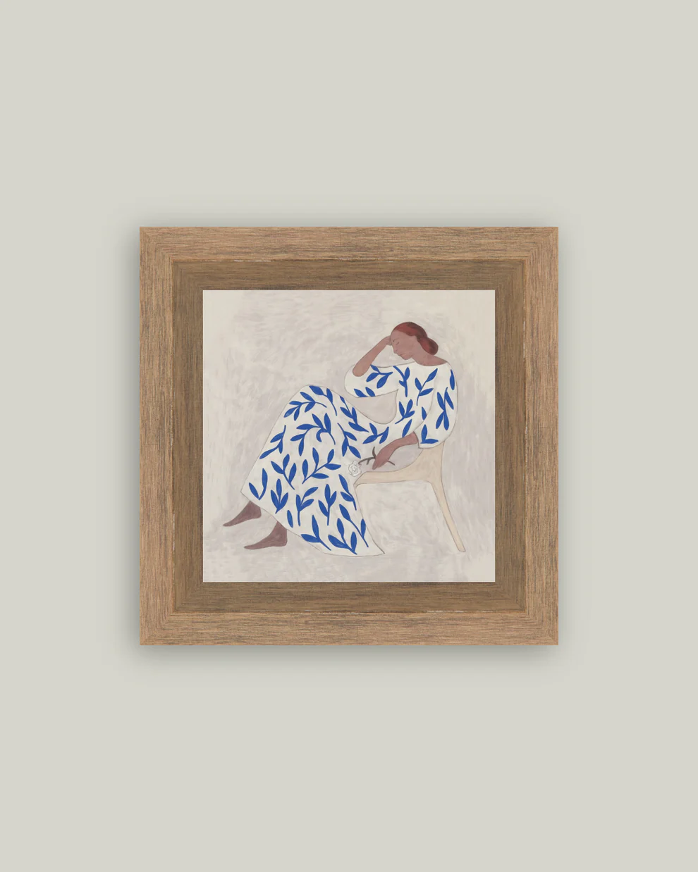 Thoughtful Woman in Blue Framed Art
